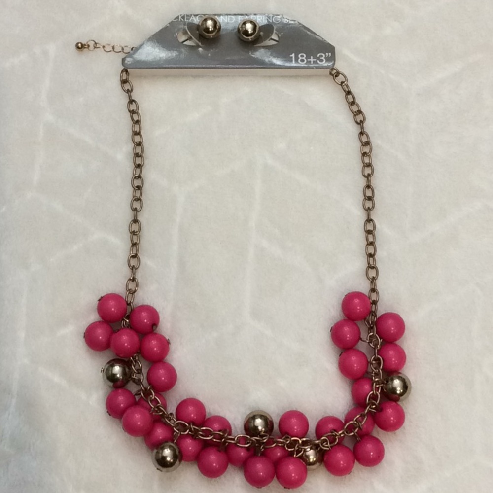 Gold and pink necklace with gold earrings